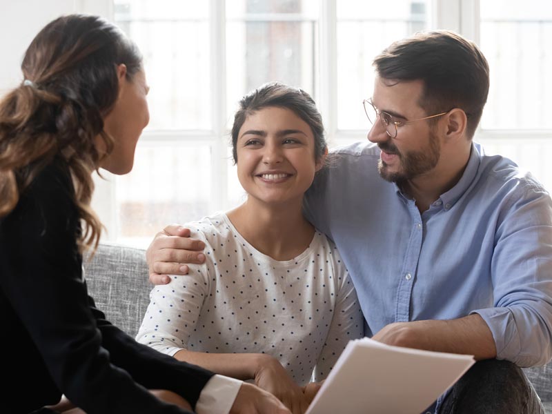 couple talking to lawyer